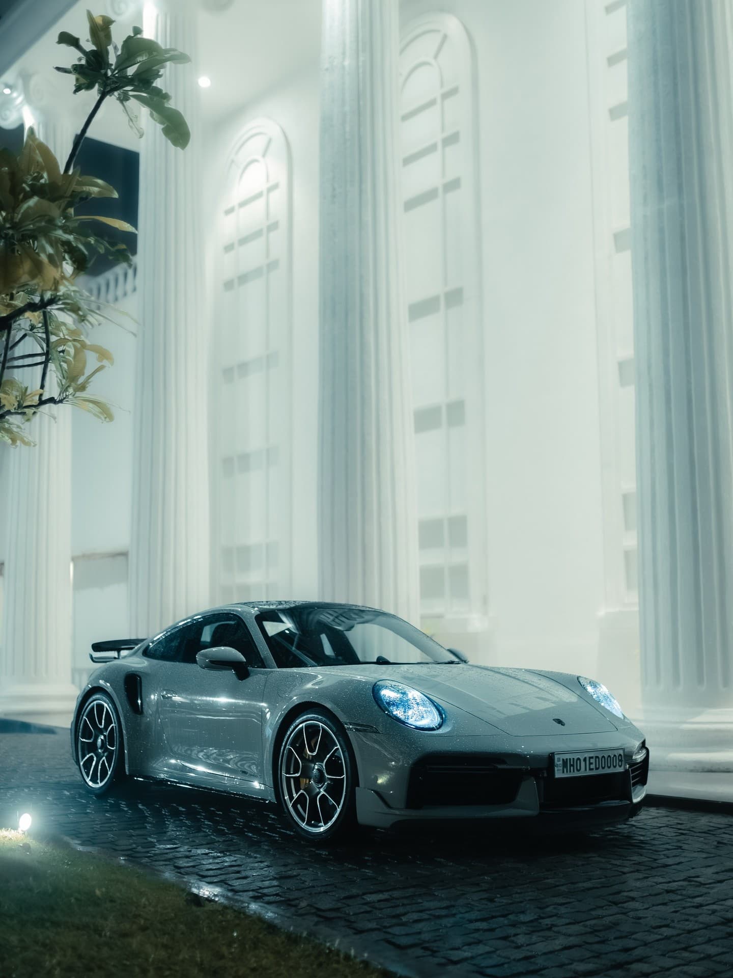 Silver Porsche at luxury estate